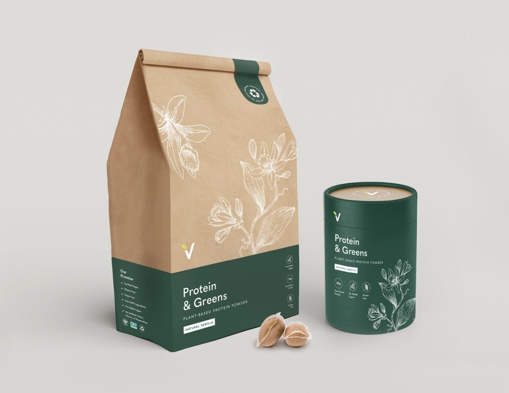 Eco-friendly protein and greens packaging made with kraft paper and cylindrical container.