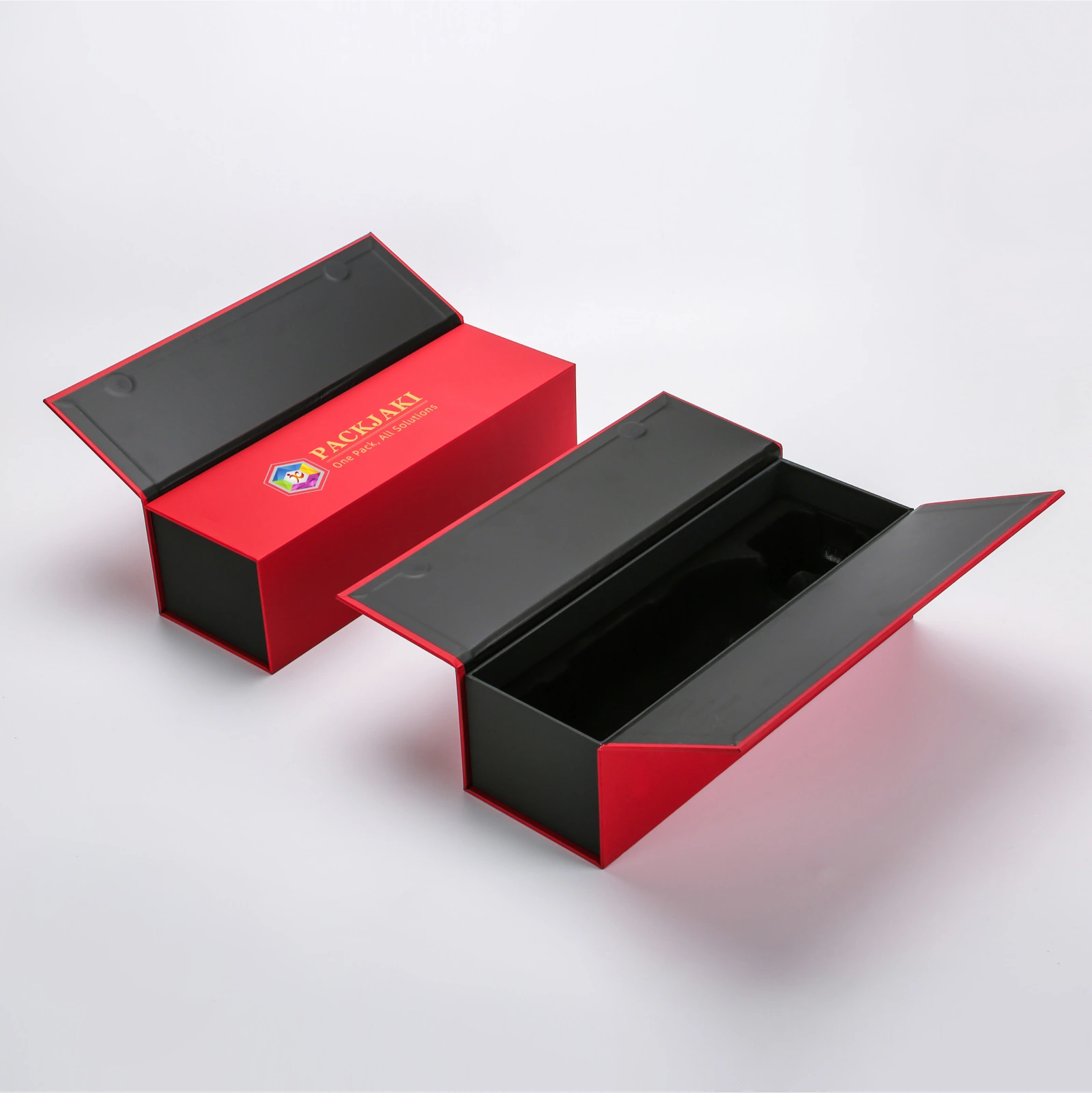 High-end custom red magnetic gift boxes with black interiors, designed for premium products by Packjaki.